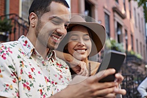 Couple Posing For Selfie On Street In New York City