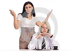 couple posing at table on white