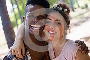 Couple posing together in the park