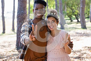 Couple posing together in the park