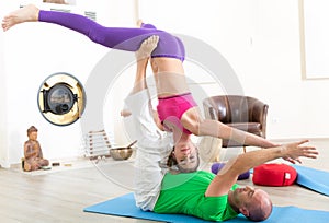 Couple practicing acroyoga