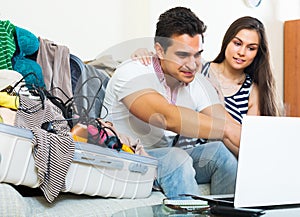 Couple preparing for honeymoon