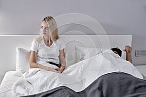 Couple With Problems Having Disagreement In Bed, Offended Female On Bed