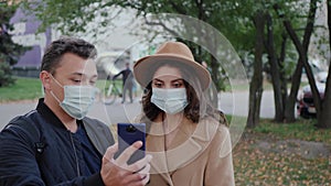Couple in protective masks