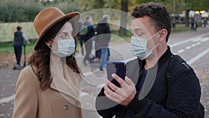 Couple in protective masks