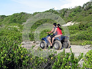 Couple in quadricycle