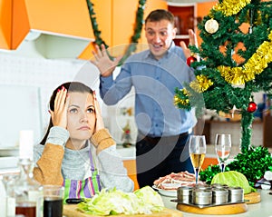 Couple quarreling at home