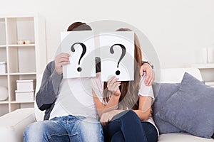 Couple with question marks