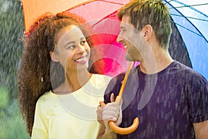 Couple with rainbow umbrella