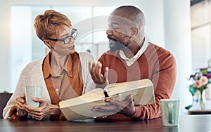 Couple reading bible, home faith and talking about religion with coffee for learning, study and education. Black man