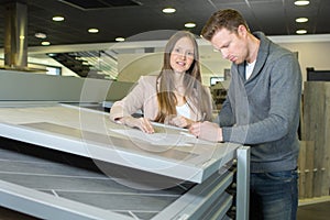 Couple reading contract document