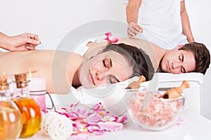 Couple receiving an acupuncture treatment