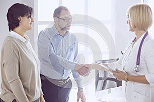 Couple at reception discussing issues with a sexologist