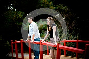 Couple on a Red Bridge