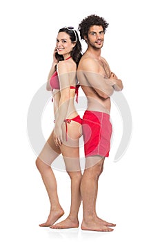 Couple In Red Swimwear