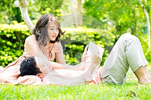 Couple relax in garden