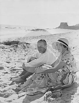 Couple relaxes at the beach