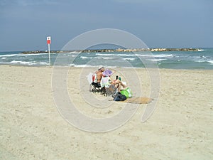 Couple relaxing on a beach