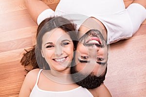 Couple relaxing on the floor