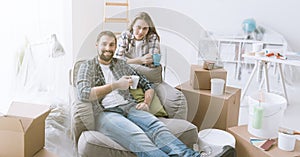 Couple relaxing during home renovation