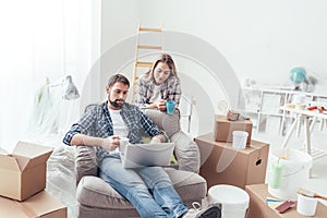 Couple relaxing during home renovation