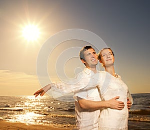 Couple relaxing near the sea