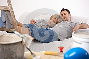 Couple relaxing after painting