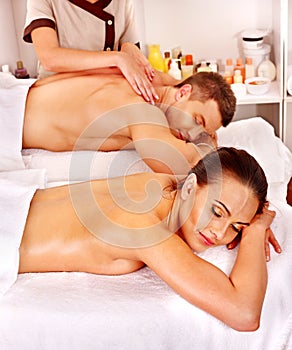 Couple relaxing in spa.