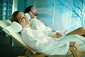 Couple relaxing in spa center