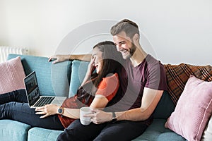 Couple relaxing together at home