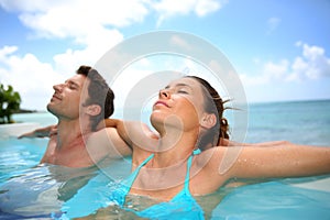 Couple relaxing in water