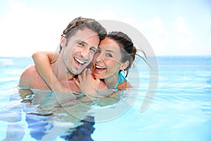 Couple in resort pool