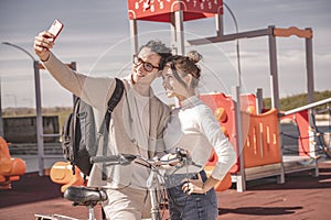 Couple resting after biking