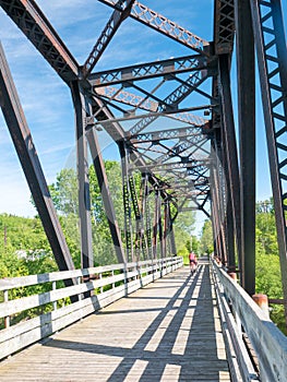 Couple riding bike in countryside, Chicoutimi, Quebec, Saguenay, Canada.