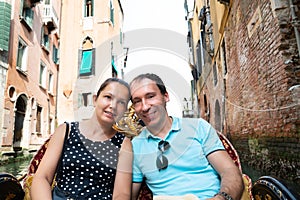 Couple Riding In Gondola, Venice, Italy