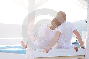 Couple in romantic hug at the sea