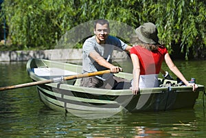 Couple in rowboat photo