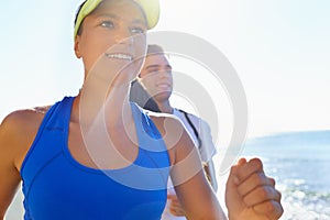 Couple, running and athlete in beach, workout and fitness with smile, training and morning for run. Man, woman and