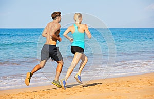 Couple running on the beach