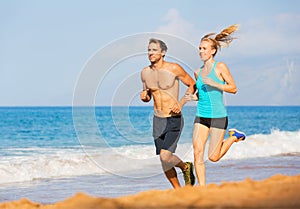 Couple running on the beach