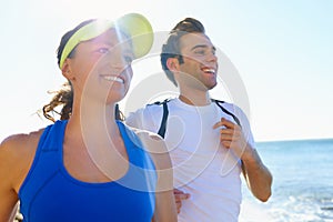 Couple, running and fitness in beach, morning and active with smile, training and athlete for run. Man, woman and