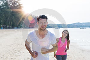 Couple Running Man And Woman Sport Runners Jogging On Beach Working Out Smiling Happy Fit Male And Female Fitness Jogger