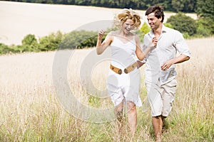 Couple running outdoors