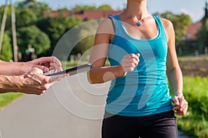 Couple running, sport jogging on rural street