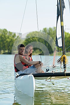 couple sailing boat