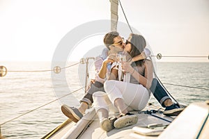 Couple sailing on boat