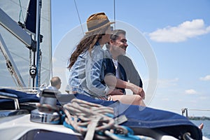 Couple on sailing boat enjoying vacation travel