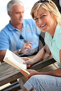 Couple sat on park bench