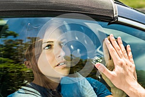 Couple Saying Goodbye Before Car Travel