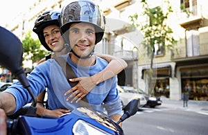 Couple On Scooter Enjoying Road Trip